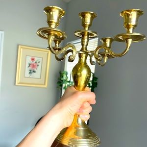 Candelabra gold color - used - very beautiful. ITS FOLDABLE :)